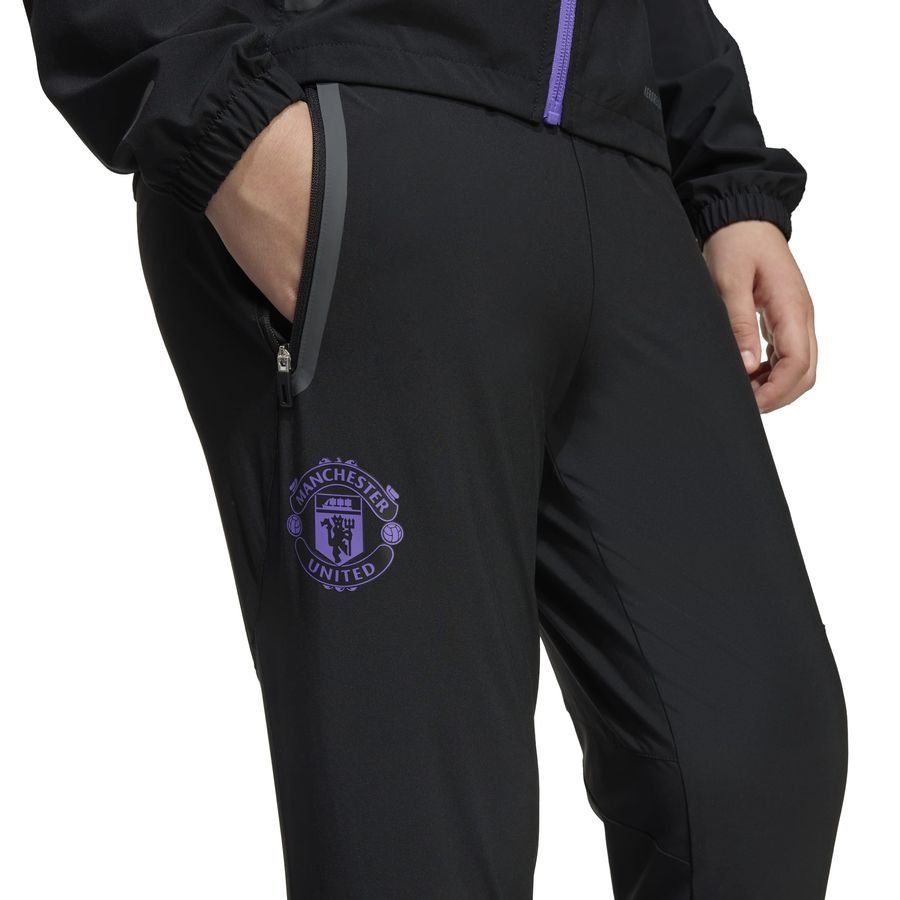 Manchester United Training Trousers Tiro 25 Competition Vis Tech Travel - Black/Purple Rush Kids-SoccerKits Hub | Buy Soccer Jerseys Online